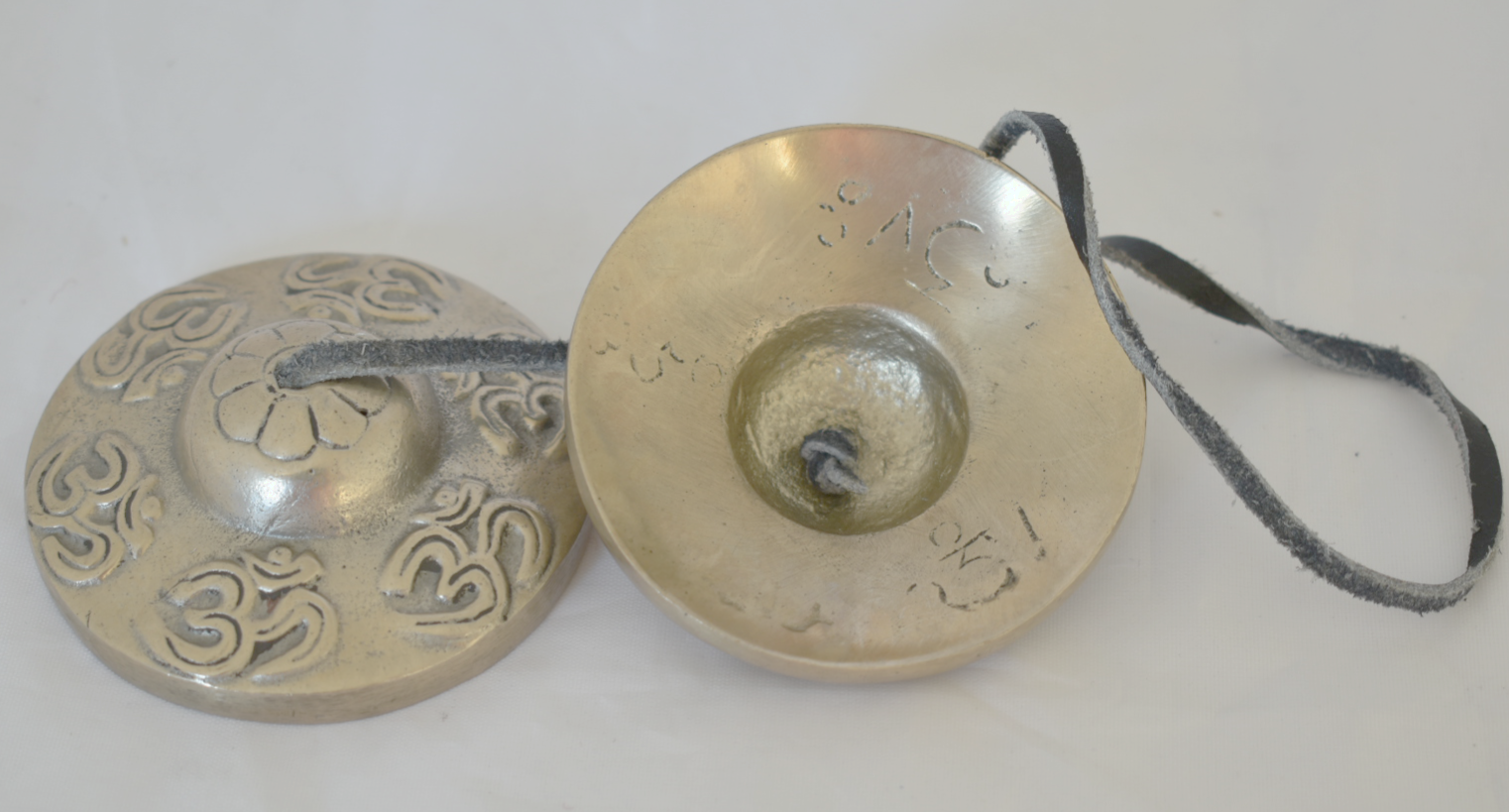 2.5" Om embossed silver NHZ Tingsha image 1